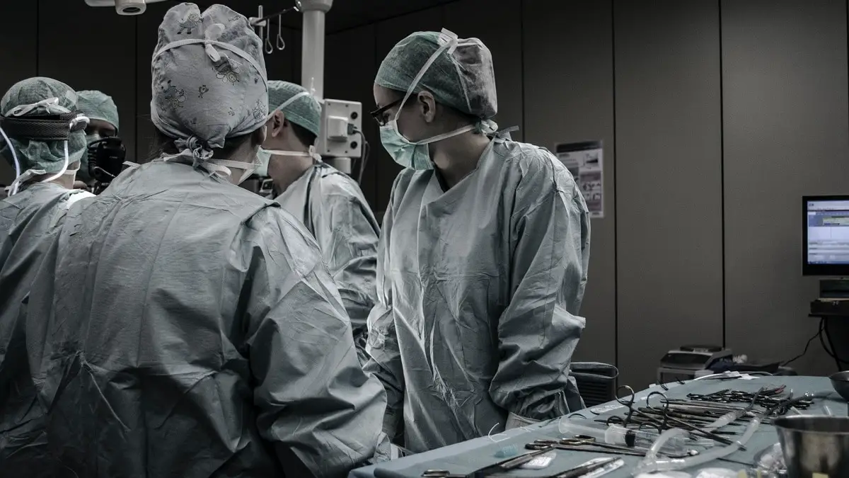 surgeons perform operation